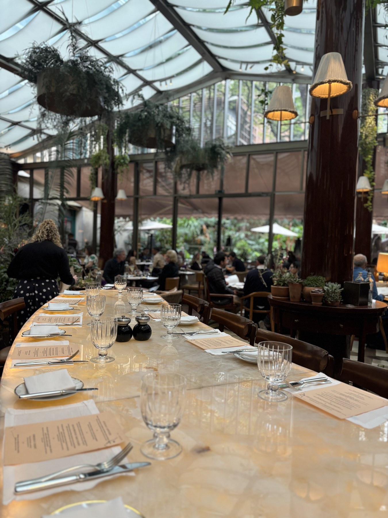 A restaurant interior at Rosewood São Paulo, set for lunch
